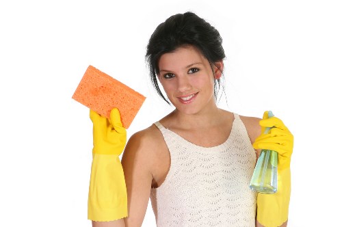 Deep cleaning of oven racks and trays in a local kitchen